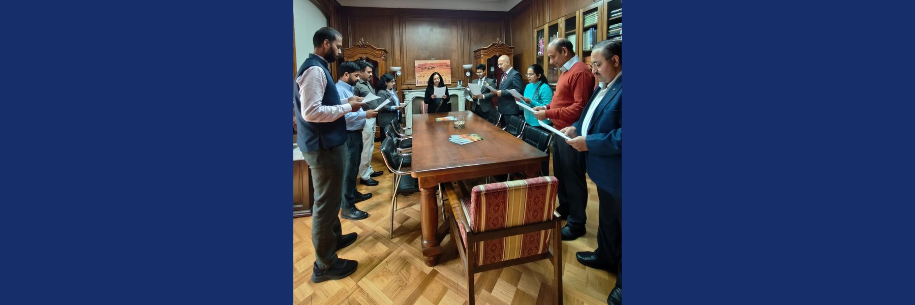Ambassador Abhilasha Joshi administering the Integrity Pledge to officials of the Embassy of India, Santiago